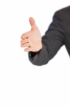 simsearch:400-07339626,k - Businessman extending arm for handshake on white background Stock Photo - Budget Royalty-Free & Subscription, Code: 400-07931279