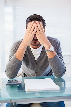 simsearch:400-07931035,k - Worried businessman with head in hands in the office Stock Photo - Budget Royalty-Free & Subscription, Code: 400-07931311