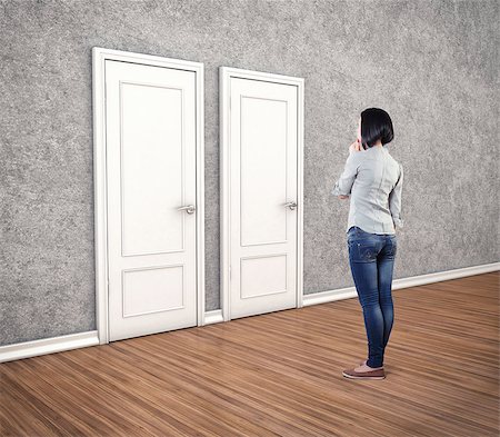 simsearch:400-06920356,k - Girl before a white doors in fear of the unknown Stock Photo - Budget Royalty-Free & Subscription, Code: 400-07932277