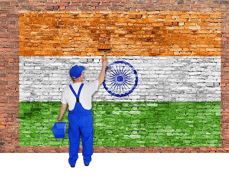 simsearch:400-08403526,k - House painter covers old  brick wall with flag of India Fotografie stock - Microstock e Abbonamento, Codice: 400-07932811