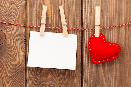 simsearch:400-07922855,k - Photo frame and handmaded valentines day toy heart over wooden background Foto de stock - Super Valor sin royalties y Suscripción, Código: 400-07933757