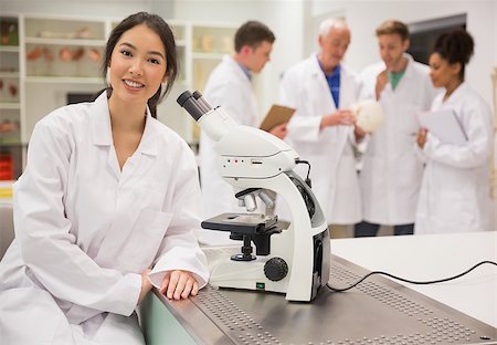 school biology - Young medical student working with microscope at the university Stock Photo - Budget Royalty-Free & Subscription, Code: 400-07940009