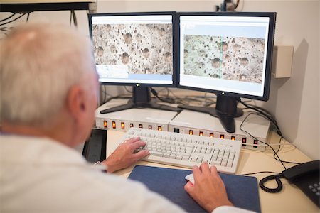 simsearch:400-07835228,k - Biochemist looking at microscopic images on computer at the university Stockbilder - Microstock & Abonnement, Bildnummer: 400-07940268