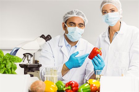 food letter t - aFood scientists looking at a pepper t the university Stock Photo - Budget Royalty-Free & Subscription, Code: 400-07940461