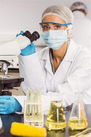 school science lab gloves - Food scientist using the microscope at the university Stock Photo - Budget Royalty-Free & Subscription, Code: 400-07940483