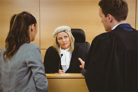 Judge wearing dress and wig listening lawyers in the court room Stock Photo - Budget Royalty-Free & Subscription, Code: 400-07940996