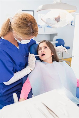 simsearch:400-07684901,k - Pediatric dentist examining her young patient in dental clinic Stock Photo - Budget Royalty-Free & Subscription, Code: 400-07941377