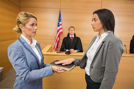 Witness taking an oath in the court room Stock Photo - Budget Royalty-Free & Subscription, Code: 400-07942485