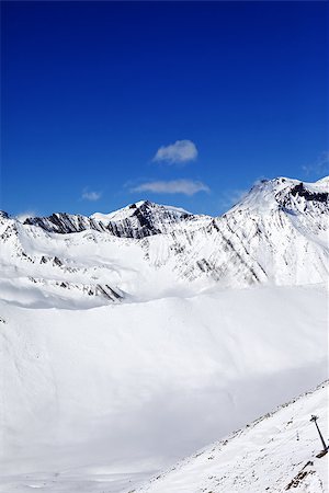 simsearch:400-04308471,k - Snowy mount at sunshine day. Caucasus Mountains. Georgia, ski resort Gudauri. Stock Photo - Budget Royalty-Free & Subscription, Code: 400-07954209