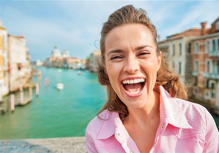 piccolo - Portrait of happy young woman standing on bridge with grand canal view in venice, italy Stock Photo - Budget Royalty-Free & Subscription, Code: 400-07954296