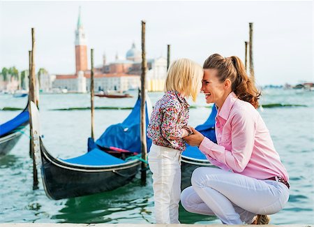 simsearch:400-08134697,k - Portrait of happy mother and baby on grand canal embankment in venice, italy Stock Photo - Budget Royalty-Free & Subscription, Code: 400-07954324