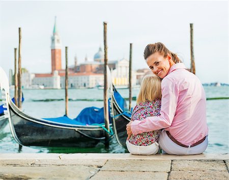 simsearch:400-08134697,k - Portrait of happy mother and baby sitting on grand canal embankment in venice, italy Stock Photo - Budget Royalty-Free & Subscription, Code: 400-07954327