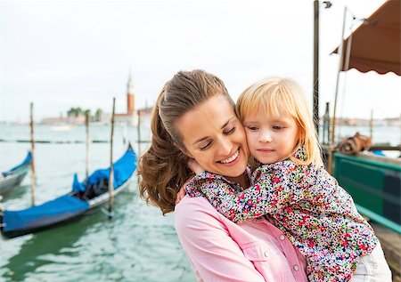 simsearch:400-08134687,k - Portrait of happy mother and baby hugging on grand canal embankment in venice, italy Stock Photo - Budget Royalty-Free & Subscription, Code: 400-07954334