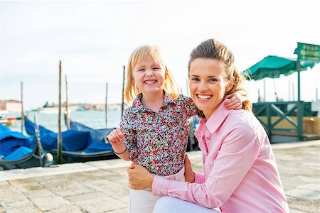 simsearch:400-08134697,k - Portrait of happy mother and baby on grand canal embankment in venice, italy Stock Photo - Budget Royalty-Free & Subscription, Code: 400-07954336