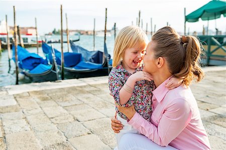 simsearch:400-07954337,k - Portrait of happy mother and baby on grand canal embankment in venice, italy Stock Photo - Budget Royalty-Free & Subscription, Code: 400-07954337