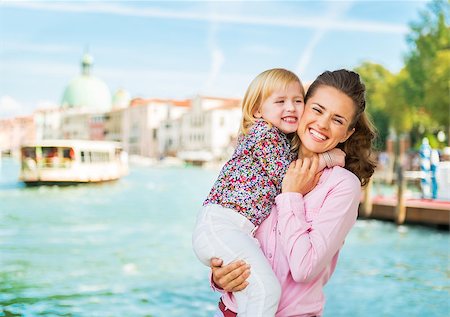 simsearch:400-07954337,k - Portrait of happy mother and baby hugging on grand canal embankment in venice, italy Stock Photo - Budget Royalty-Free & Subscription, Code: 400-07954340
