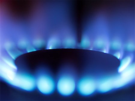 close up of a gas stove blue flame Foto de stock - Super Valor sin royalties y Suscripción, Código: 400-07954568