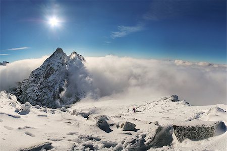 simsearch:400-07309307,k - Alpinist climbing on Rysy mountain peak in High Tatras. Slovakia. Poland. High Tatras Stockbilder - Microstock & Abonnement, Bildnummer: 400-07955012