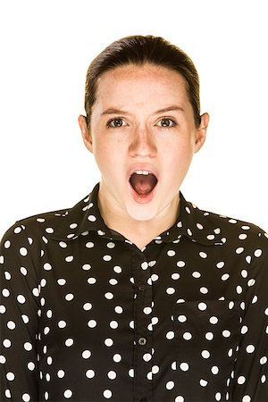 Shocked looking caucasian woman on a white background Stock Photo - Budget Royalty-Free & Subscription, Code: 400-07955393