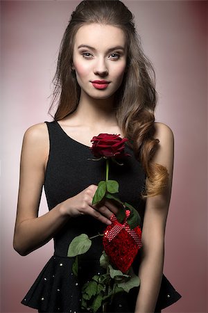 simsearch:400-07986693,k - Young, beautiful, elegant girl with lice make up in black dess is holding valentine's present like rose and heart. Stock Photo - Budget Royalty-Free & Subscription, Code: 400-07955867