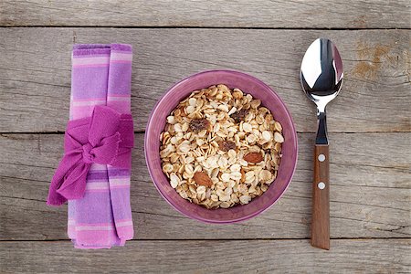 simsearch:400-08113690,k - Healthy breakfast with muesli. View from above on wooden table Stock Photo - Budget Royalty-Free & Subscription, Code: 400-07955897