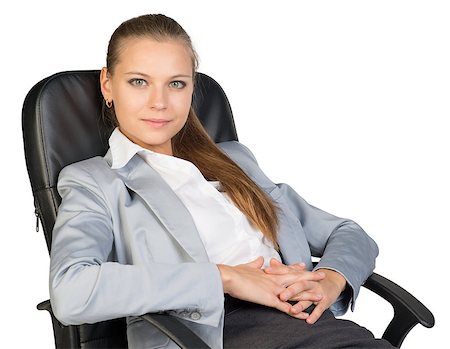 Businesswoman back in office chair, looking at camera cheerfully, with her hands clasped over her stomach. Isolated over white background Stock Photo - Budget Royalty-Free & Subscription, Code: 400-07955936