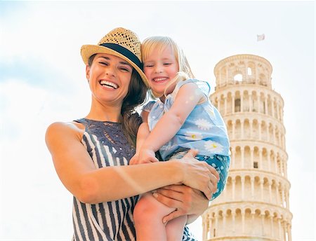 simsearch:400-08134687,k - Portrait of smiling mother and baby girl in front of leaning tower of pisa, tuscany, italy Stock Photo - Budget Royalty-Free & Subscription, Code: 400-07956936