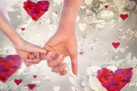 simsearch:400-07957006,k - Loving young couple holding hands against love heart pattern Stock Photo - Budget Royalty-Free & Subscription, Code: 400-07957017