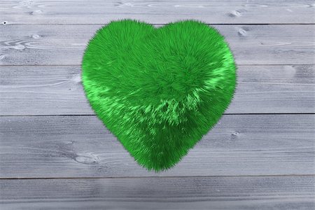 simsearch:400-07957226,k - Green heart against bleached wooden planks background Stock Photo - Budget Royalty-Free & Subscription, Code: 400-07957275