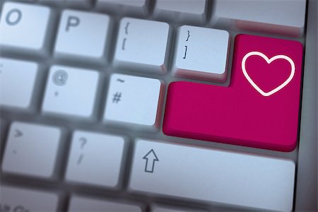 simsearch:400-07957805,k - heart against pink enter key on keyboard Photographie de stock - Aubaine LD & Abonnement, Code: 400-07957654