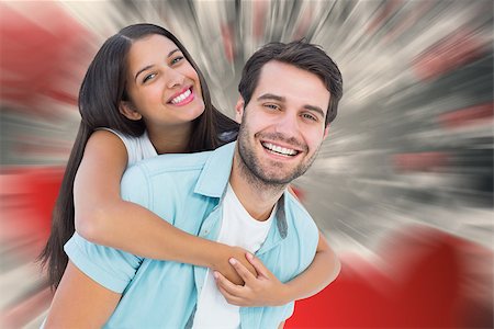 simsearch:400-07957212,k - Happy casual man giving pretty girlfriend piggy back against love heart pattern Stock Photo - Budget Royalty-Free & Subscription, Code: 400-07957795