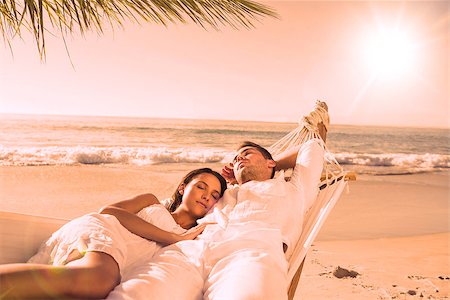 Calm couple napping in a hammock at the beach Stock Photo - Budget Royalty-Free & Subscription, Code: 400-07957965