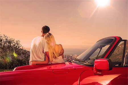 Rear view of couple hugging and admiring panorama on a sunny day Stock Photo - Budget Royalty-Free & Subscription, Code: 400-07957977