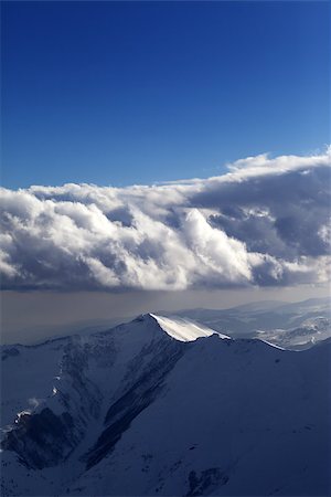 simsearch:400-07211845,k - Winter mountains in nice evening. Caucasus Mountains, Georgia, view from ski resort Gudauri. Stockbilder - Microstock & Abonnement, Bildnummer: 400-07951303