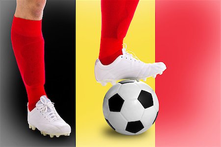 simsearch:400-06513403,k - Belgium soccer player with football for competition in Match game. Stock Photo - Budget Royalty-Free & Subscription, Code: 400-07951924