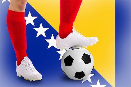 simsearch:400-06513403,k - Bosina and Herzegovina soccer player with football for competition in Match game. Stock Photo - Budget Royalty-Free & Subscription, Code: 400-07951925