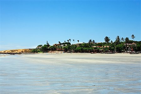 view of the big sand dune of the beautiful fisherman village of Jericoacoara in ceara state brazil Photographie de stock - Aubaine LD & Abonnement, Code: 400-07952514