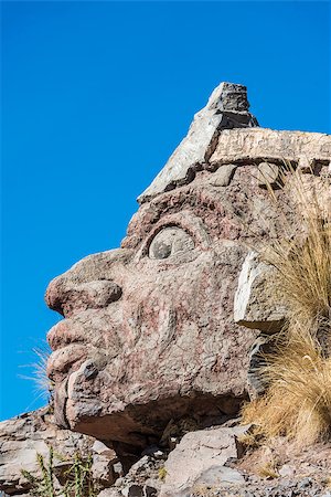puno - Inca face sculpture in the peruvian Andes at Puno Peru Photographie de stock - Aubaine LD & Abonnement, Code: 400-07952604