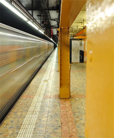car of New York City Subway drinving along the platform, whith a public phone Stock Photo - Budget Royalty-Free & Subscription, Code: 400-07952827