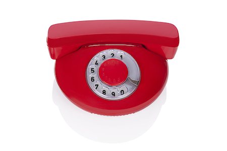 Red retro phone isolated on white background. Retro design from the sixties. Stock Photo - Budget Royalty-Free & Subscription, Code: 400-07952870