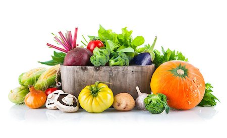 simsearch:400-08375763,k - Fresh vegetables in wooden bucket with leaf lettuce. Isolated on white background Stock Photo - Budget Royalty-Free & Subscription, Code: 400-07952910