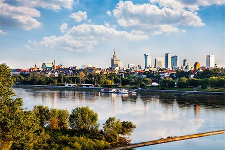 simsearch:400-07953086,k - Warsaw downtown at afternoon sun.  Sky is reflected in the river. Stock Photo - Budget Royalty-Free & Subscription, Code: 400-07953867