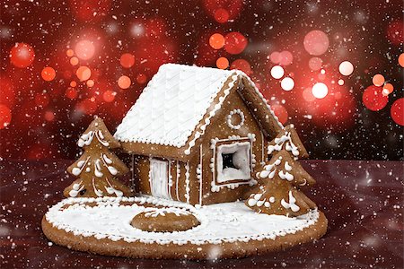 snowflakes on window - homenade holiday Gingerbread house with bokeh and snowflakes Stock Photo - Budget Royalty-Free & Subscription, Code: 400-07974294