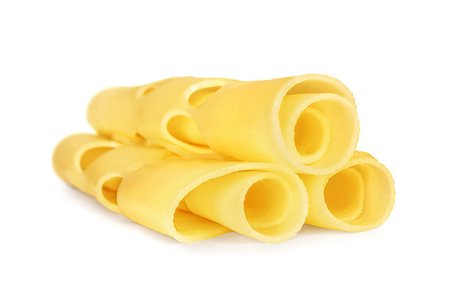 simsearch:400-03928596,k - three rolled slices of Swiss cheese, served for breakfast or as a stylish snack, on white background Foto de stock - Royalty-Free Super Valor e Assinatura, Número: 400-07974371