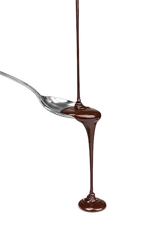 dark chocolate - Chocolate poured into a spoon on white background Photographie de stock - Aubaine LD & Abonnement, Code: 400-07974387