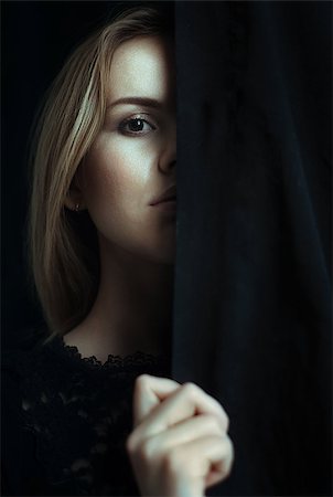 shmel (artist) - Portrait of a young girl with clean skin on a black background close-up Stock Photo - Budget Royalty-Free & Subscription, Code: 400-07974609