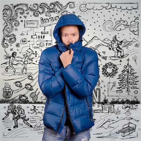 Asian man in blue down-padded coat, with winter fun sketch background Stock Photo - Budget Royalty-Free & Subscription, Code: 400-07975273