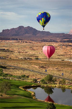 hot air balloon floating over the red navajo sandstone in Arizona with a beautiful landscape Photographie de stock - Aubaine LD & Abonnement, Code: 400-07975717