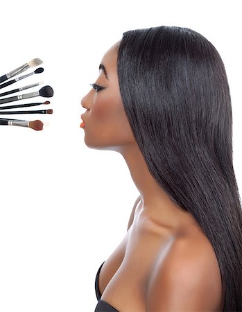 simsearch:400-07292674,k - Black woman with straight hair and makeup brushes isolated on white Photographie de stock - Aubaine LD & Abonnement, Code: 400-07976827