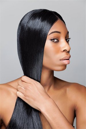 simsearch:400-06179308,k - Black beauty with long straight and shiny hair Stock Photo - Budget Royalty-Free & Subscription, Code: 400-07976823